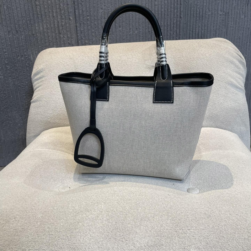 H**mes shopping bags